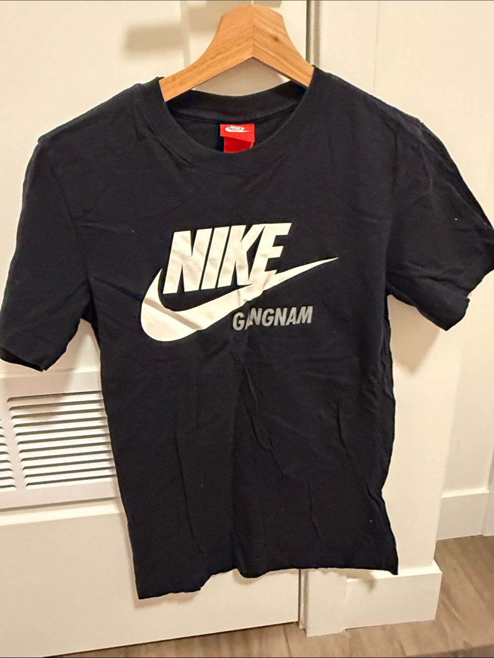Nike Black Short Sleeve Tee with White Swoosh and 'GANGNAM' Graphic